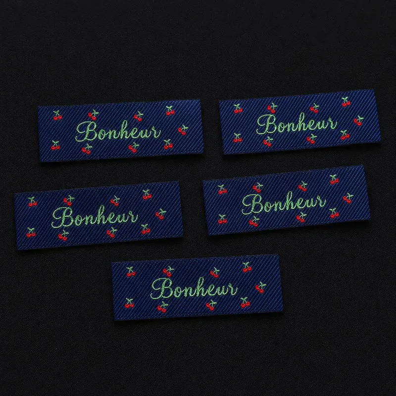 Étiquettes tissées « Bonheur » | Motif cerises | Paquet de 5