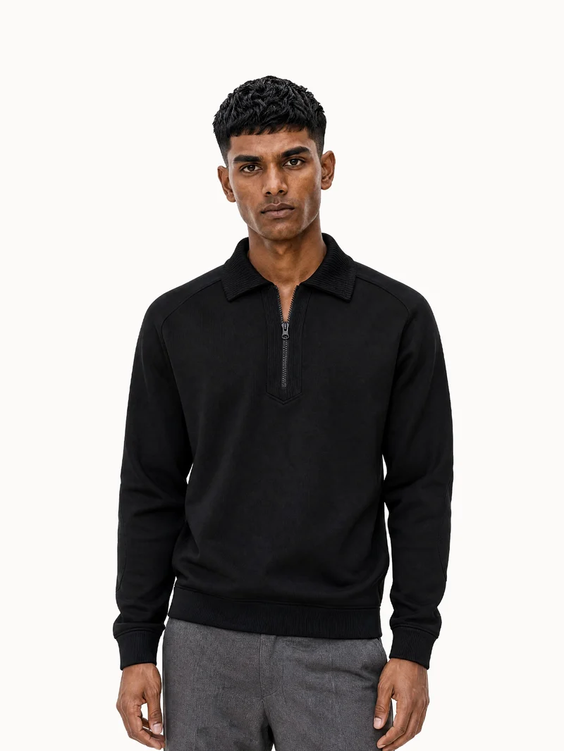 Sweat demi-zippé manches raglan en double face