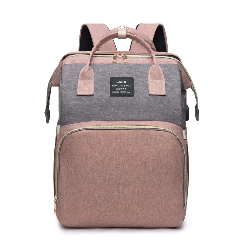 Sac à langer imperméable avec matelas intégré