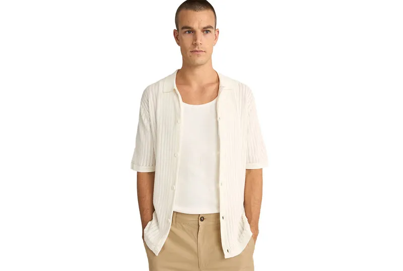 POLO EN TRICOT À BOUTONNAGES